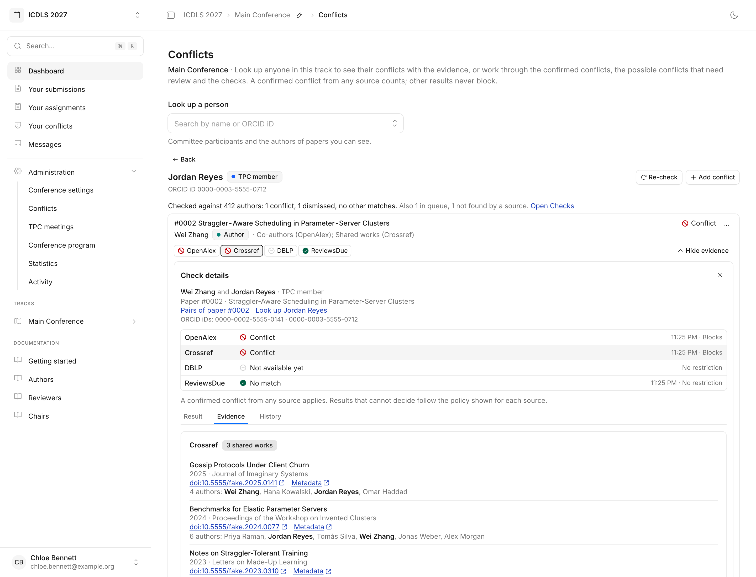 The Conflicts page open on one committee member: the summary of what was checked, a conflict with an author on a paper, each source’s result, and the shared works behind it with their authors.